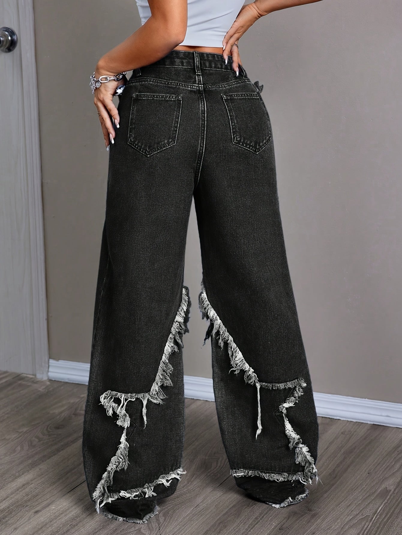 New Stylish Women'S Denim Pants with Unique Patches And Fringe, Featuring a Straight And Wide-Leg Design.